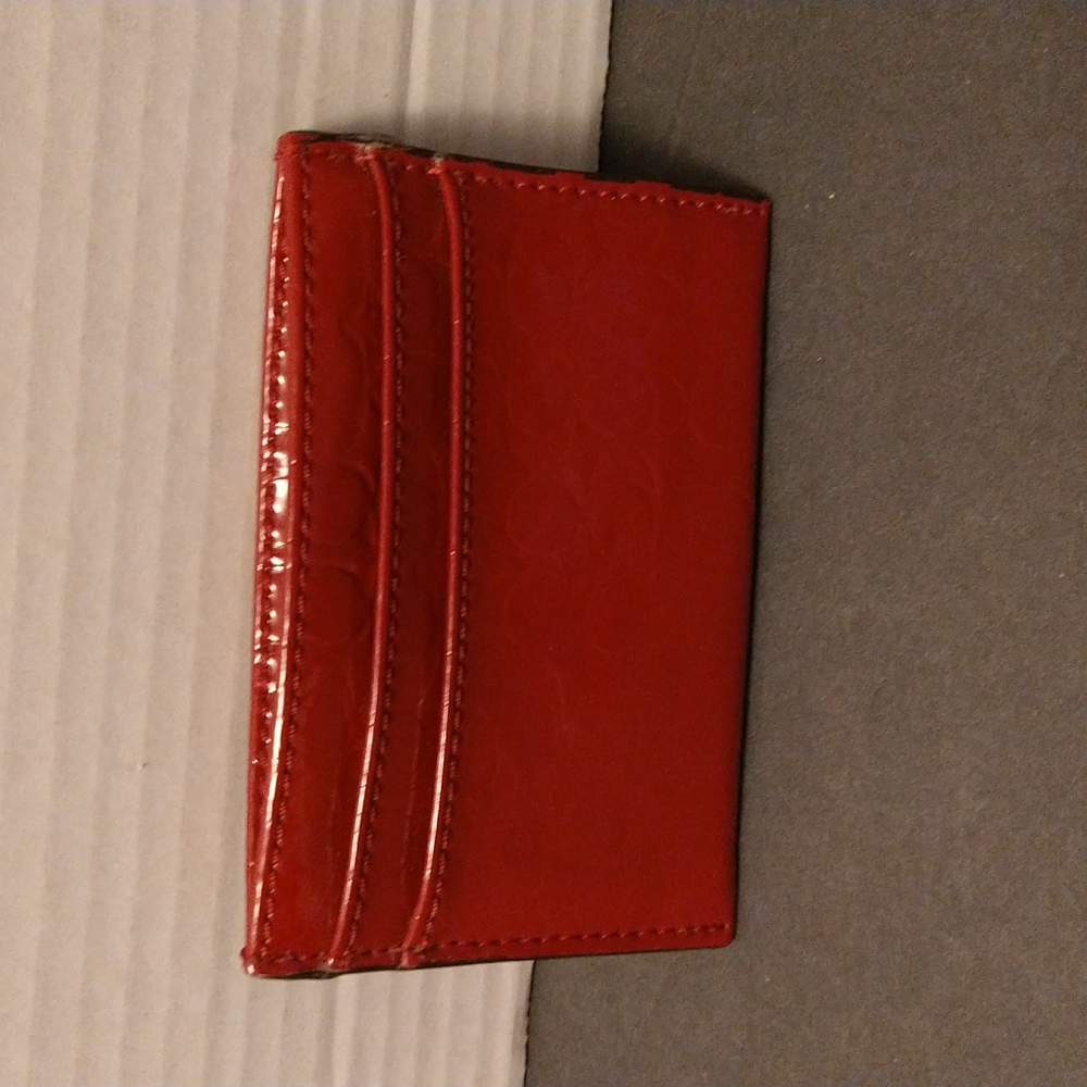 VGUC. Coach Burgundy red card holder.